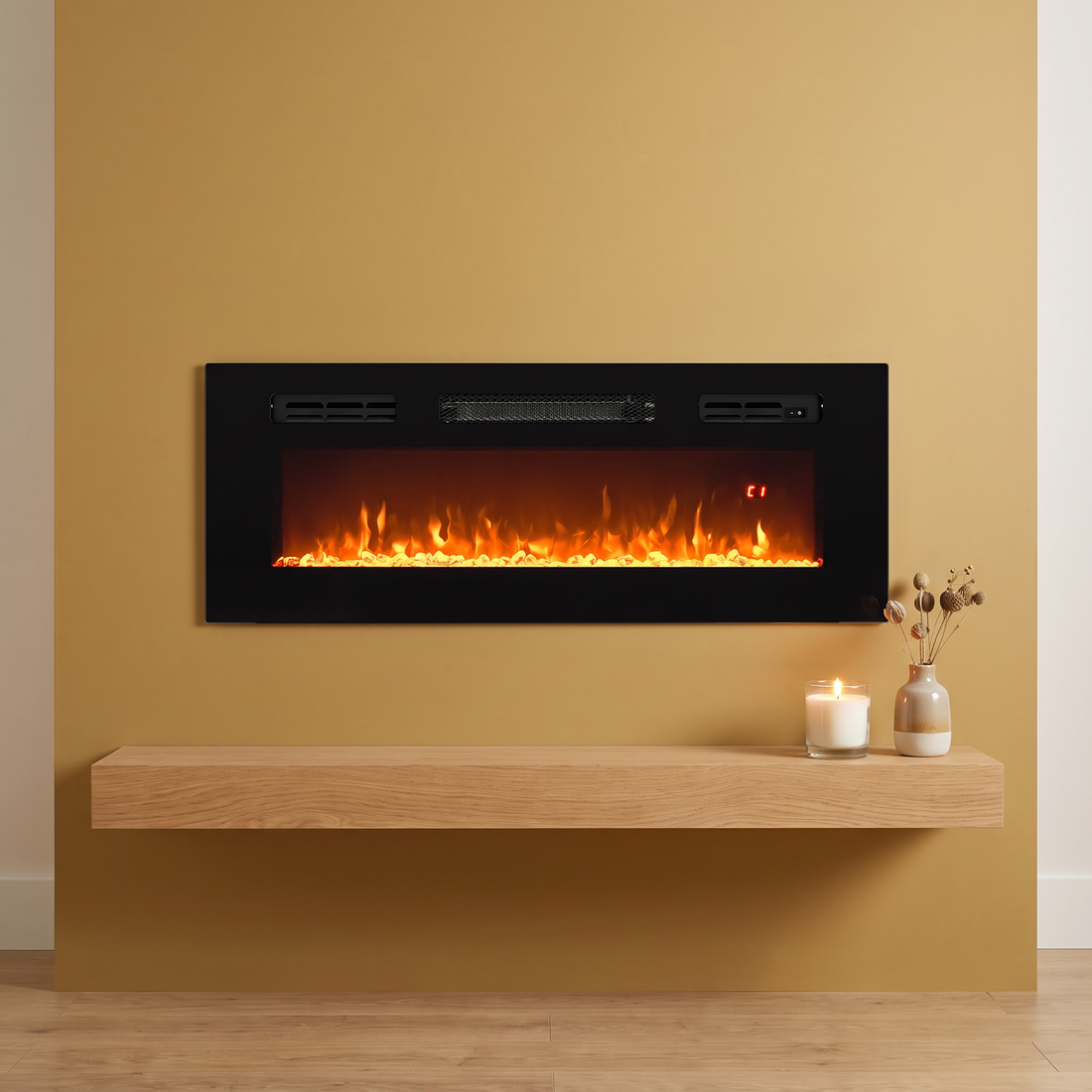 The Glow Hearth 36 inch recessed electric fireplace set into a gold wall above an oak shelf