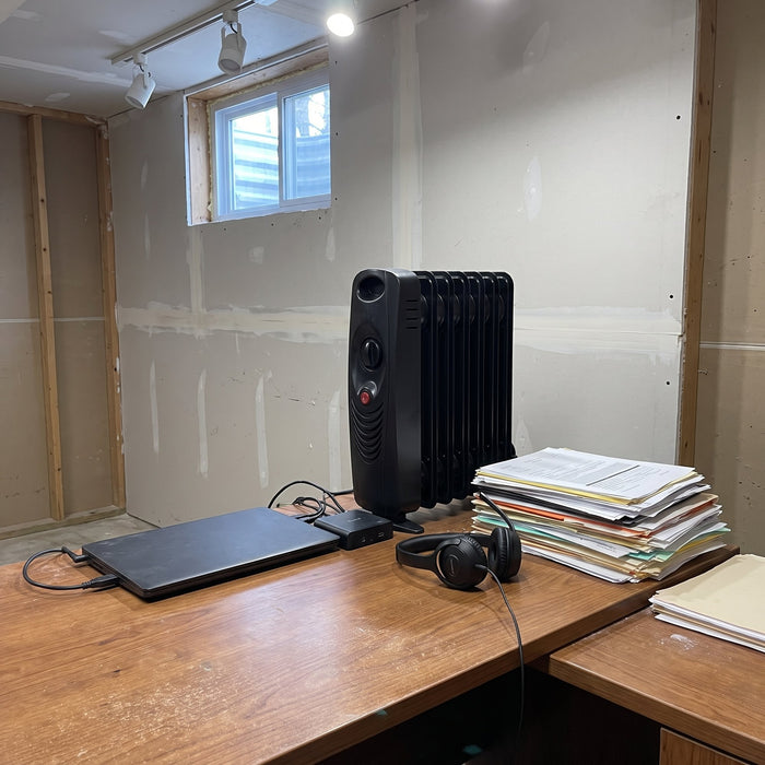 Basement office went from miserable to comfortable at my chair.