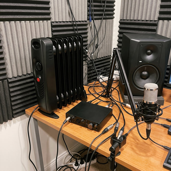 Picked the black one for my studio. Looks way better than white.